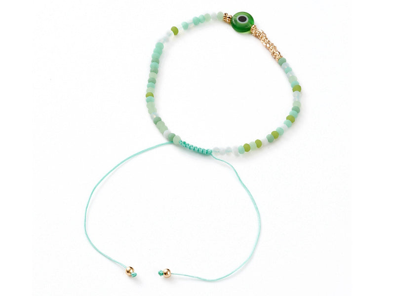 achat Bracelet perles œil vert - porte bonheur- - taille ajustable