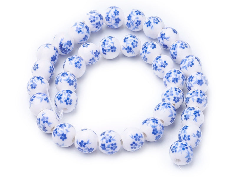 Achat 10 perles en céramique imprimées fleurs - Bleu