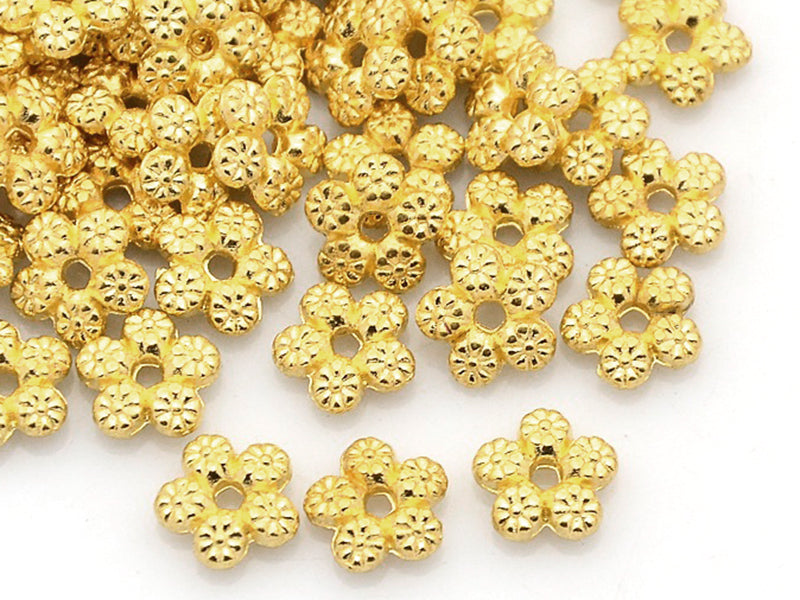 Achat 20 perles fleurs intercalaires plates et dorées - 7 mm