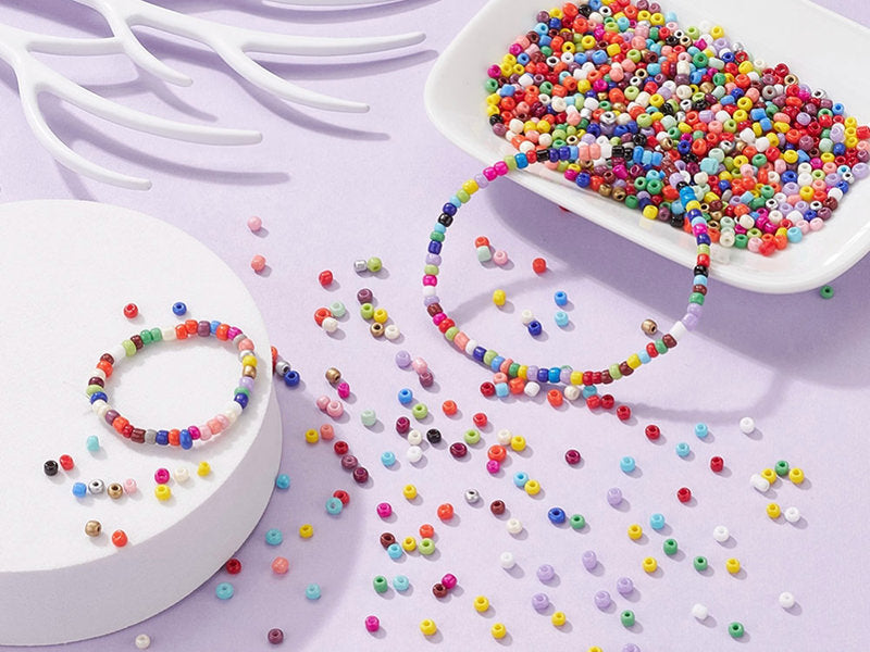 achat Boite de 24 couleurs de perles de rocailles rondes - 8/0 soit environ 3 mm de diam.