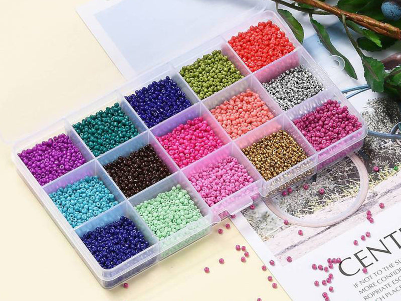 Achat Boite de 15 couleurs variées de perles de rocailles rondes 12/0 - 2mm env.