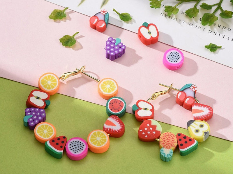 achat Boite de 12 compartiments de perles fruits en pâte polymère - Multicolore