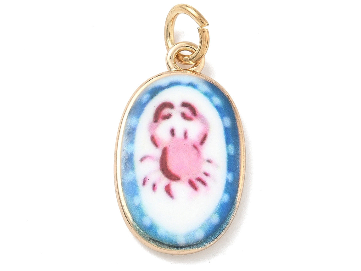 Achat Breloque ovale motif crabe imprimée - laiton doré